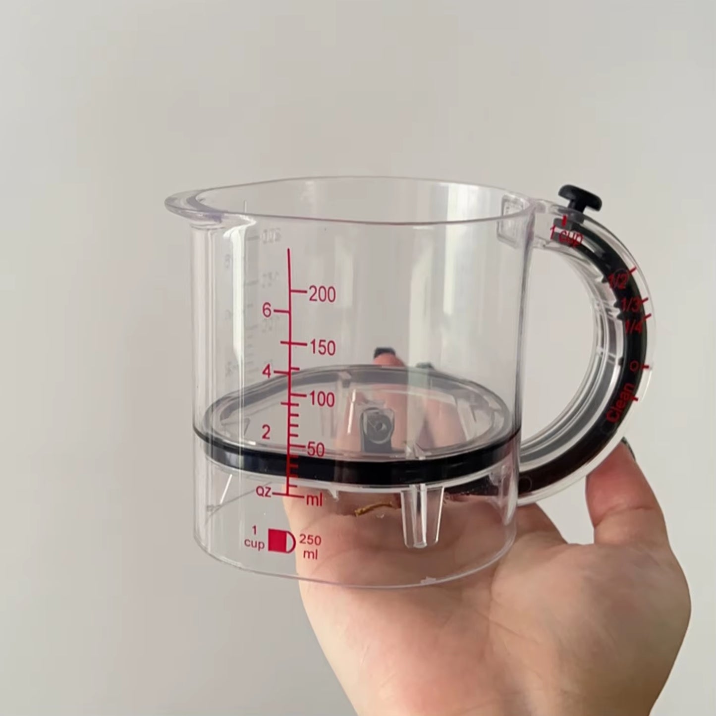 Versatile 4-in-1 Adjustable Measuring Cup with Innovative Scraper Base for Effortless Cooking